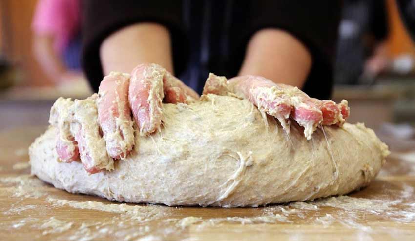 knead-the-white-bread-dough-
