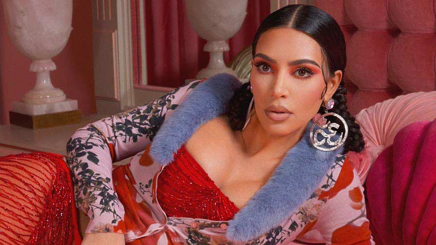 Cultural Appropriation in fashion Kim Kardashian sporting Om earrings for KKW beauty campaign