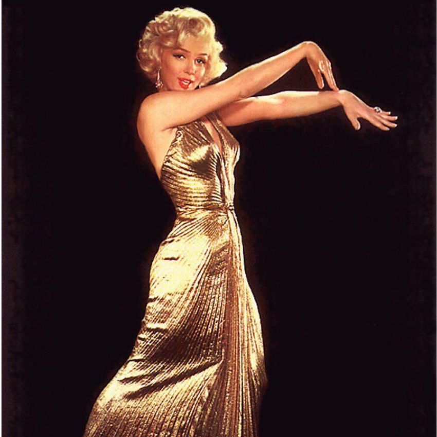 Marilyn monroe 1953 fashion gold halter dress plunging neckline pleated Carmen Marc Valvo metallic